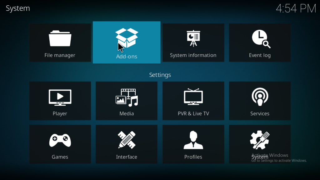Kodi Add-ons browser screen with the open box/package icon highlighted in the top-left corner